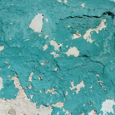 Teal background of a weathered wall
